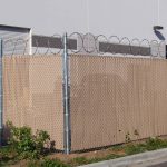 10-Chink-Fence-With-70-Approx.-Privacy-Slats-Barbed-Wire-and-Razor-Ribon-1024x769