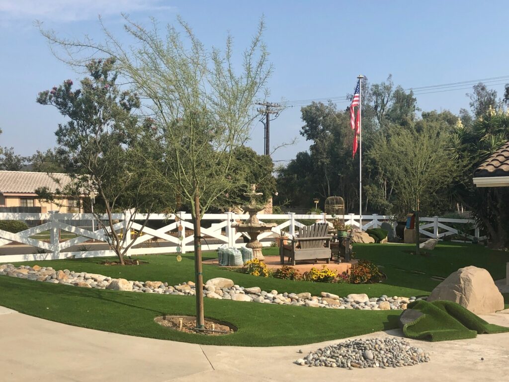 Vinyl crossbuck ranch rail fence by Alpine Fence Company.