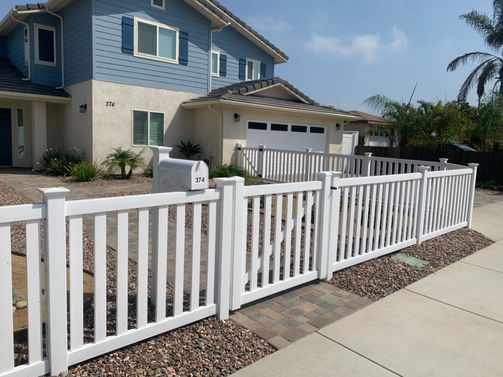 White universal vinyl fence by Alpine Fence Company.