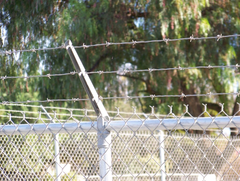 Commercial chain-link fence by Alpine Fence Company.