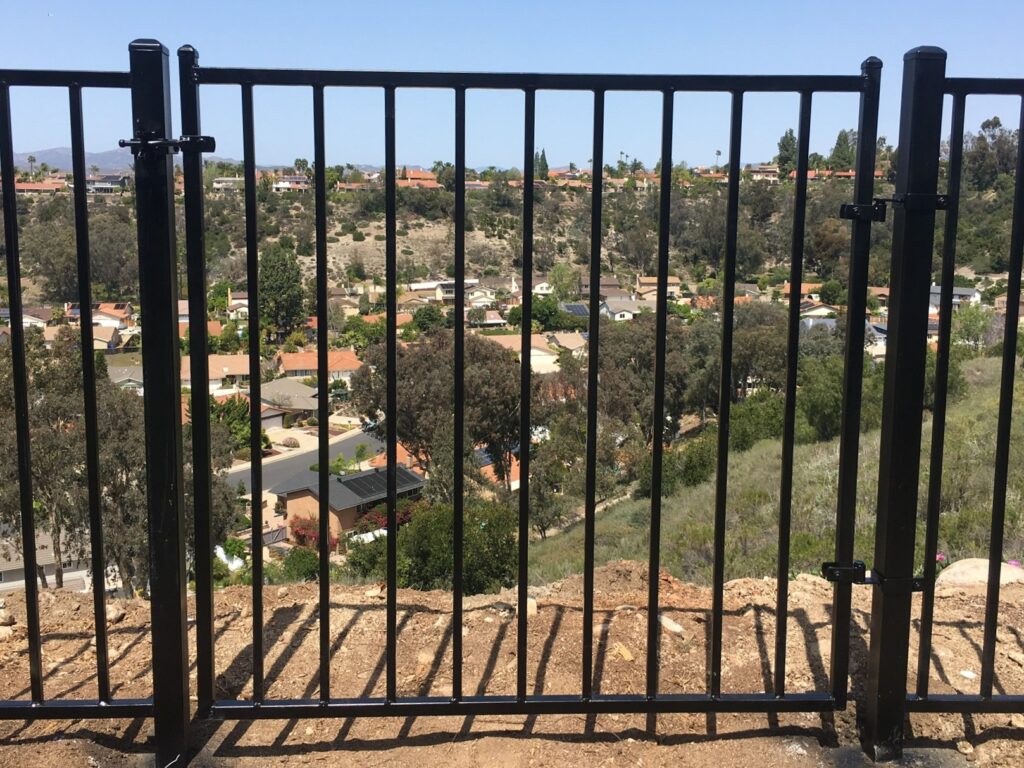 Standard iron gate by Alpine Fence Company.