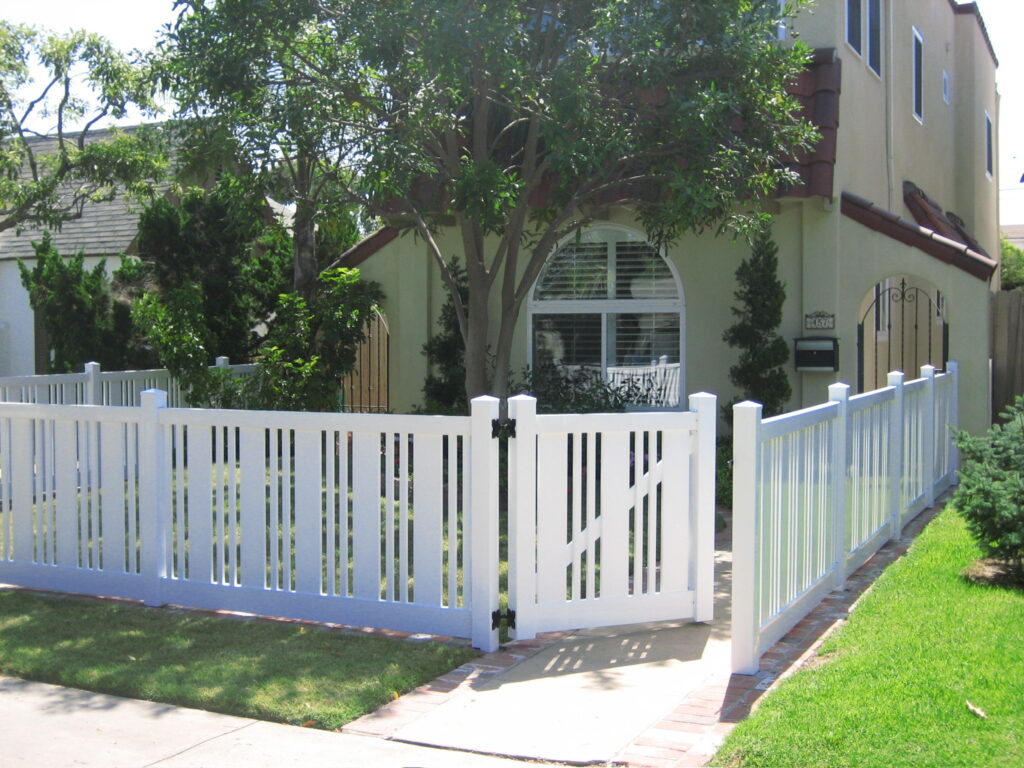 Decorative universal vinyl fence by Alpine Fence Company.