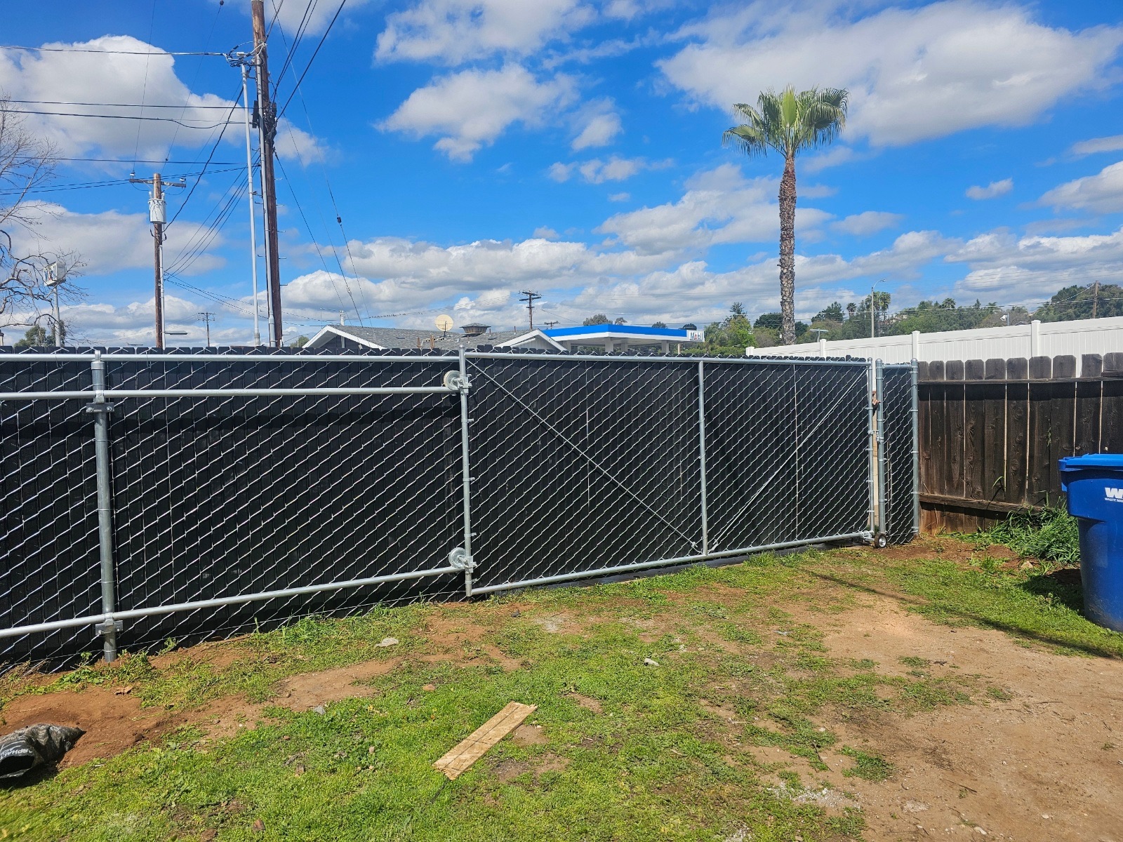 13. Interior view of a smooth-gliding chain-link slide gate.