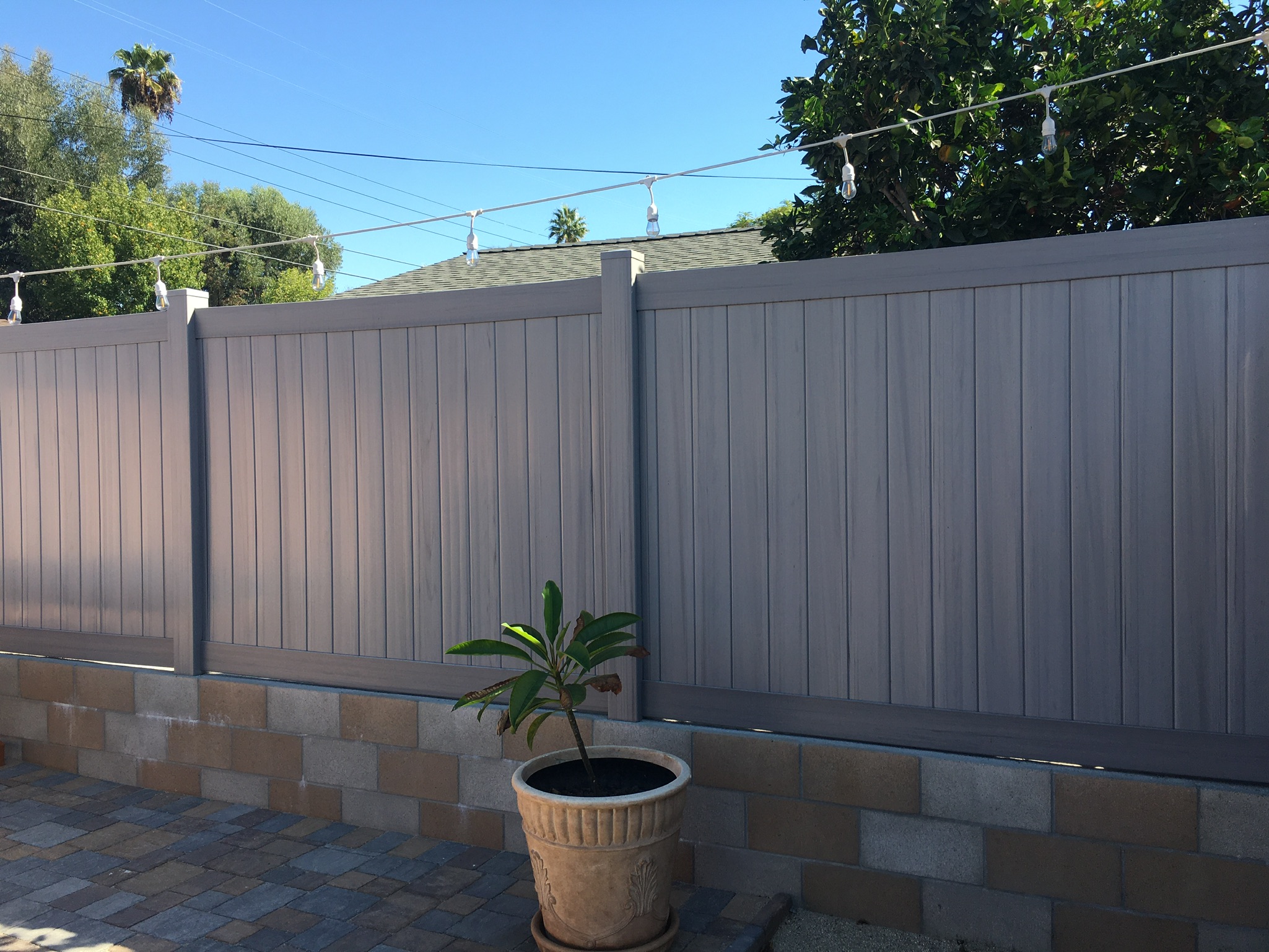 Coastal cedar privacy vinyl fence by Alpine Fence Company.