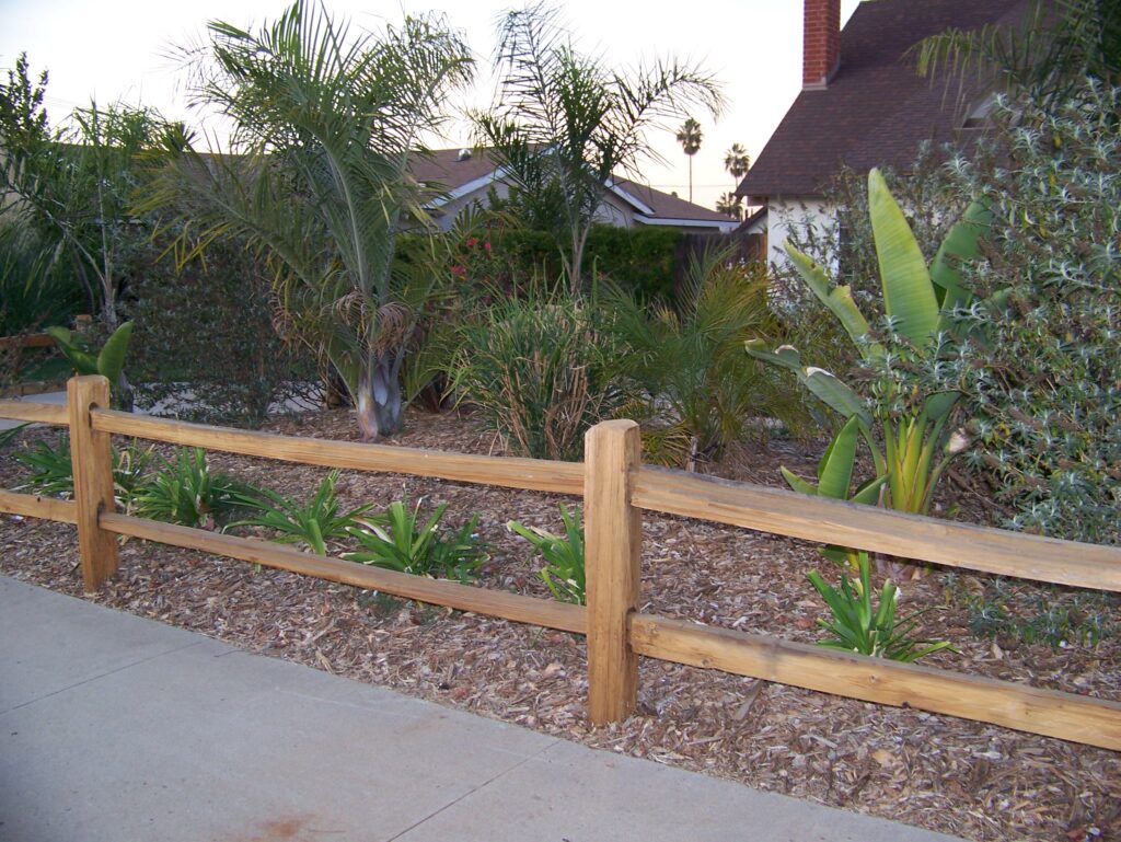 Wood cedar split rail fencing by Alpine Fence Company.