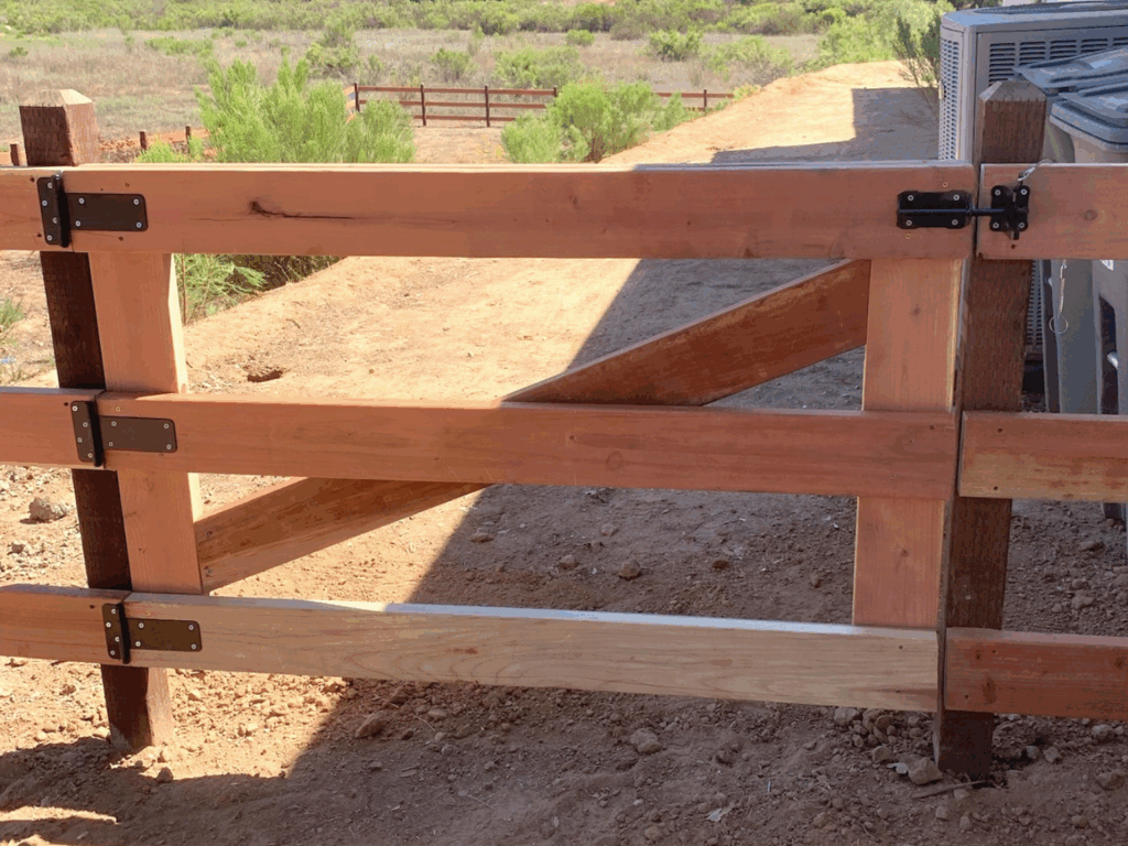 Wood ranch rail gate by Alpine Fence Company.