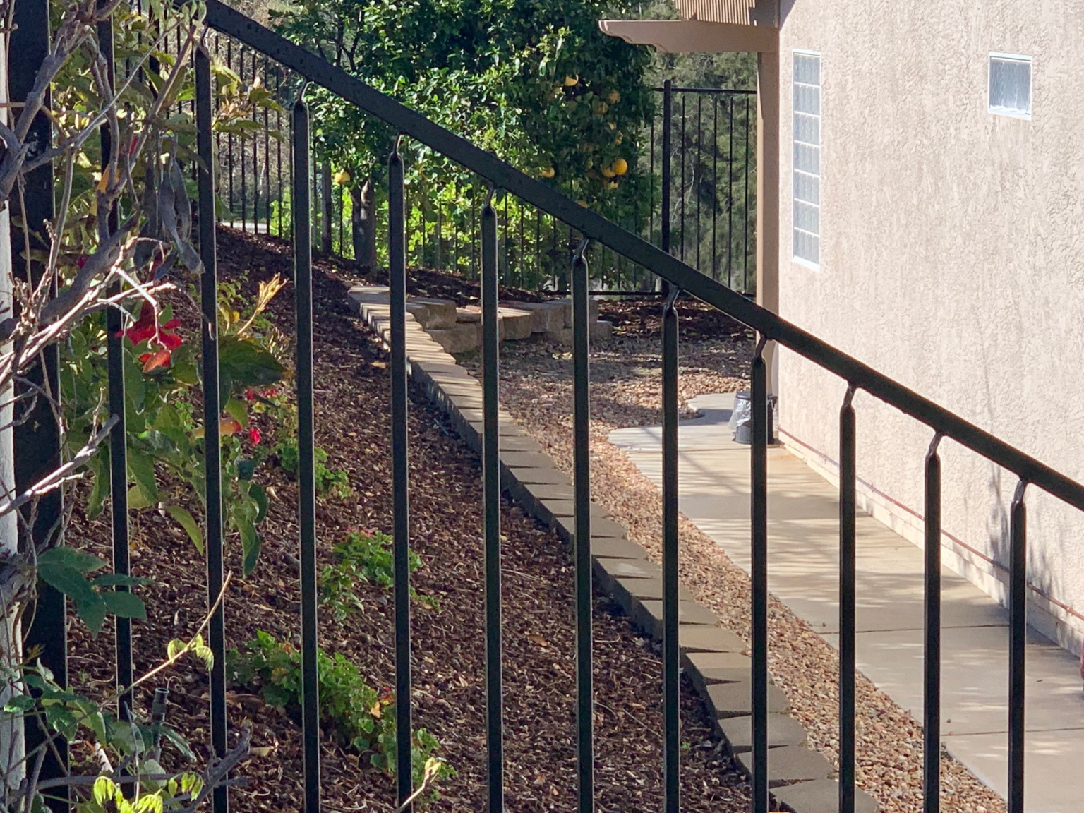 Adjustable iron panel by Alpine Fence Company.