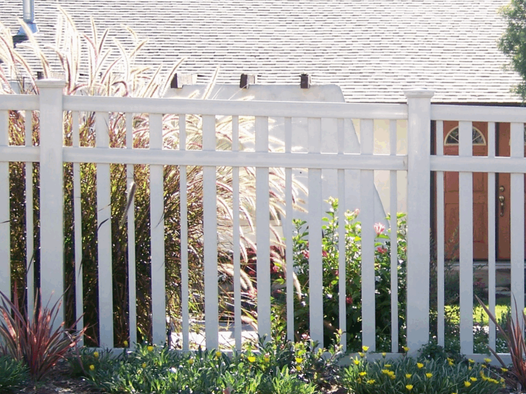 Decorative universal vinyl fence by Alpine Fence Company.