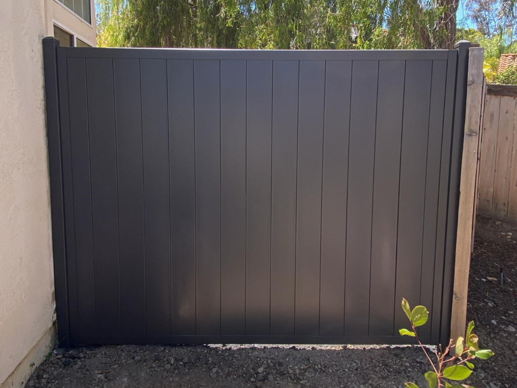 7. Vertical metal privacy fence.