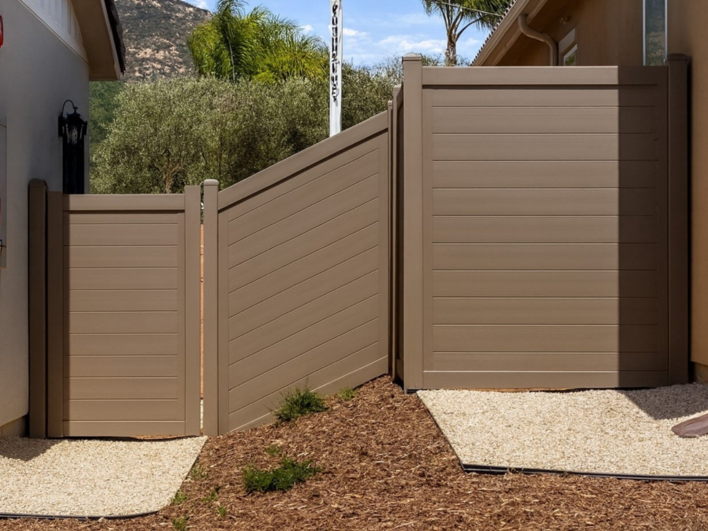 12. Horizontal metal privacy fence with sloped section.